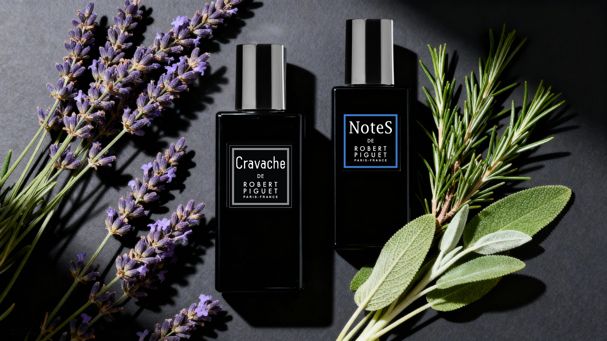 Cravache and NoteS perfume bottles surrounded by lavender and sage